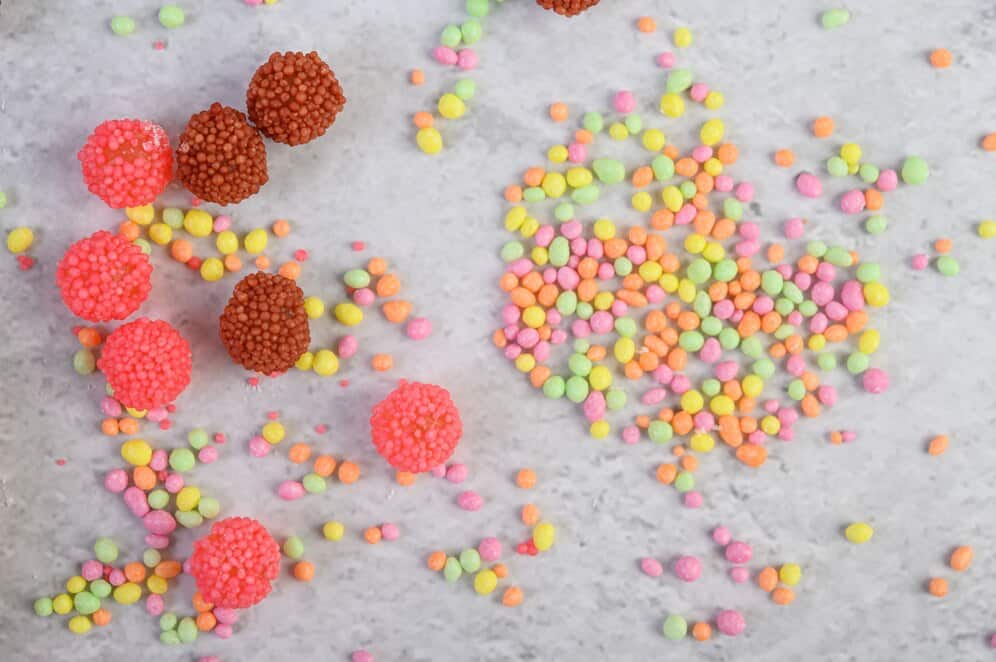 Close-up of Smarties with faded colors and sticky texture